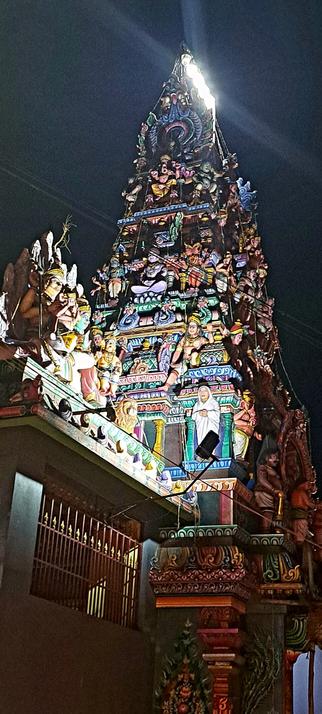 Outside structure of a south Indian temple with various deities.