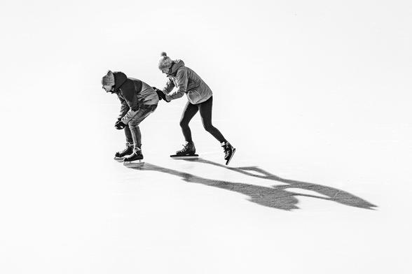 Two people skating, one pushing the other

Photo credit: Lucas van Oort on Unsplash