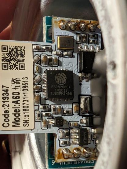 Pic showing a close up of the ESP8266EX board in an old Feit smart bulb.