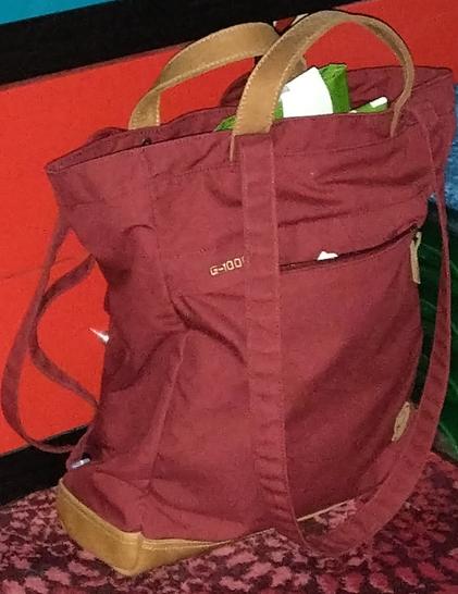 Burgundy bag from Fjällräven.