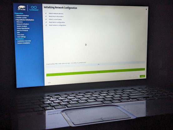 openSUSE Tumbleweed installer running on a laptop