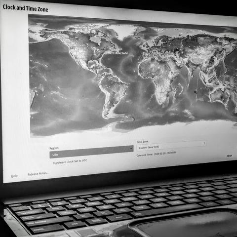 openSUSE Tumbleweed installer running on a laptop