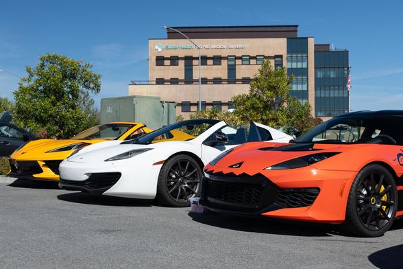 Three colorful sports coupes.