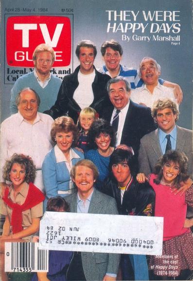 Cast poses togther, there is a paper adress lable bloking one face, and Scott Baio had a printig error where is mouth is missing.