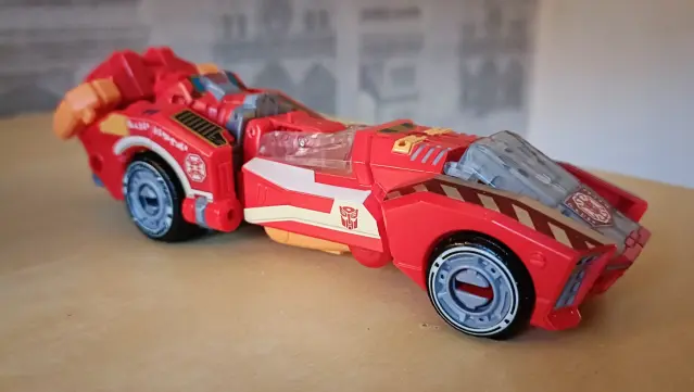 Novastar is a Cybertronian (cough) car, a long and narrow thing of futuristic design. This one has Toyhax stickers applied increasing the Bling factor significantly. These molds are also good in that the Combiner backpack bit really suits being attached to the vehicle mode instead of sticking out like a sore thumb on most others so I've pictured that here.