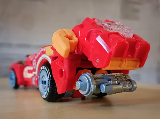 The rear of the vehicle mode. Normally you'd see her two robot fists kinda just hanging out at the back here but I've plugged her weapon into one as kind of a vehicle part, almost like a engine where the rear bumper lives on Earth cars, which works surprisingly well.