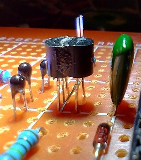 another shot of the dancing transistors. it could depict a wedding, too, with a green capacitor as priest and three NTCs as guests