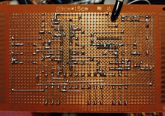 the bottom of the board.l, showing the soldering. I'm quite happy with the result, even if I had to redo a part to the right due to an error in the schematics. thankfully there was enough space to fix it.