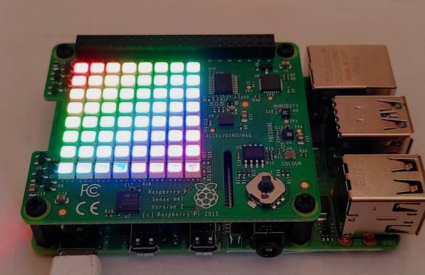 Rainbow fade of LEDs shown on the Sense HAT (Hardware Attached on Top) of a Raspberry Pi.