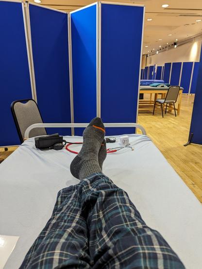 Lying in bed waiting for the next potential surgeon to arrive.