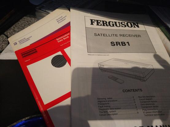 Three manuals: a Ferguson SRB1 BSB Receiver service manual, a Fairchild Semiconductor Semicustom Databook and a National Semiconductor Terminal Management Processor databook.