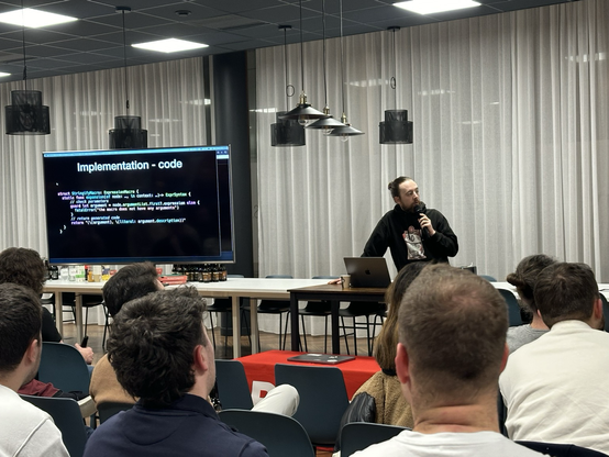 Pierre presenting slides about macros