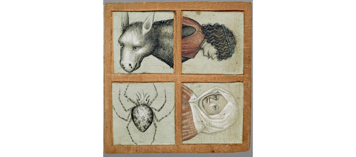une fiche : 
1 tête d'homme,
1 de femme avec voile blanc
2 animaux : tête d'âne et araignée entière (et franchement bien dessinée)