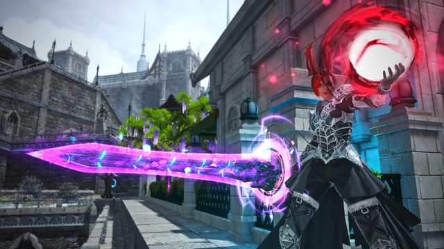 Rav holding the Manderville Perfect Relic behind her while in her off hand she summons a ball of sinister red magic in Ishgard.
