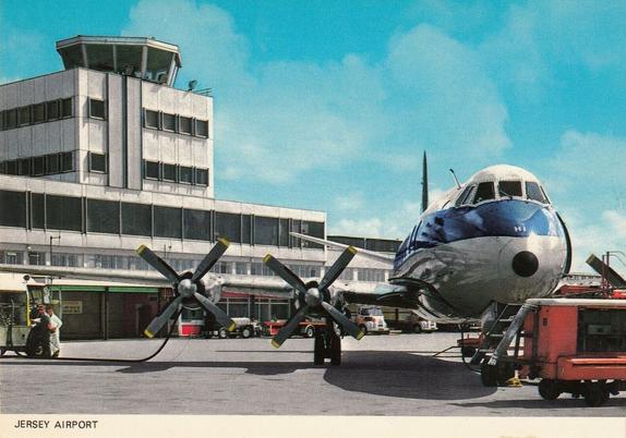 you see the small tower on top of the terminal. There is a prop plane waiting for passengers as its refueled.
