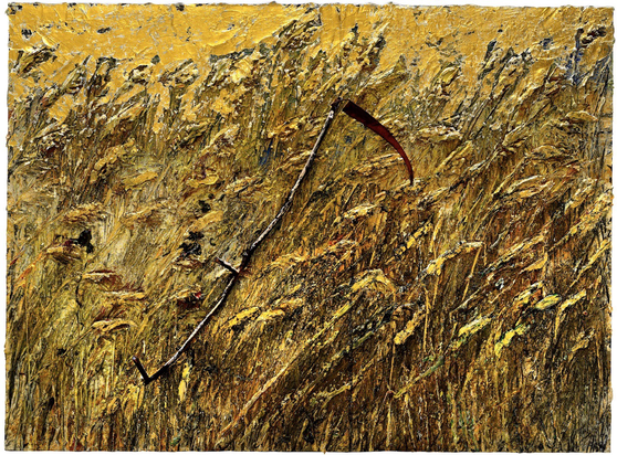 “An endless field of golden wheat glows against a setting sun, the horizon punctuated by a dozen scythes, their blades the color of rust. Ein Wort von Sensen gesprochen (One Word Spoken by Scythes, 2019–20) was one of the paintings by Anselm Kiefer on view at the Gallery Gagosian’s Le Bourget location in the exhibition “Field of the Cloth of Gold.” “
