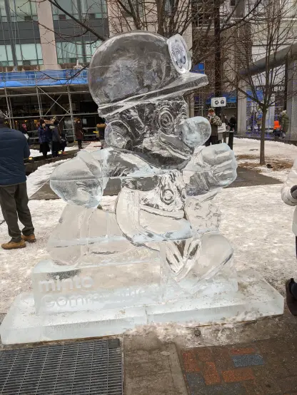 An ice sculpture of Mario. He's wearing Miner's hat but he is depicted in his usual self!