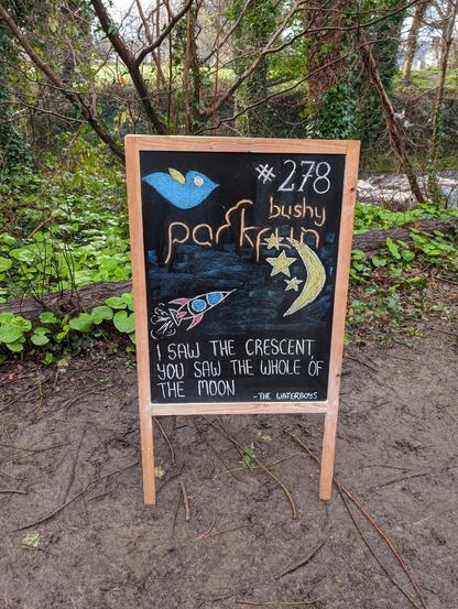 Sandwich board showing Bushy Parkrun #278