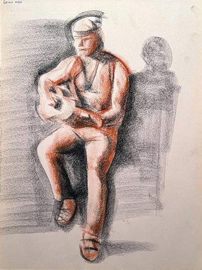 Charcoal sketch of a man playing the guitar