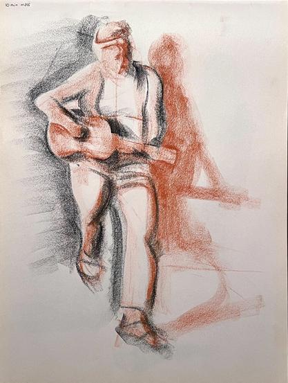 Charcoal sketch of a man playing the guitar