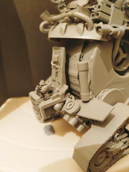 A detail shot of the rear of the same model. Here we can see a small gun emplacement at the back in which one of the scale figures has been placed.