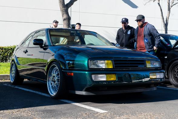 Dark metallic green hatchback