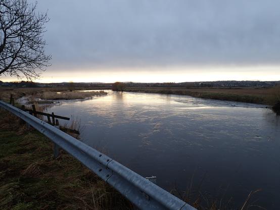 The River Don. No flooding but looking very full. Cloudy day but the sun was trying to come out as it got lower on its way to bed.