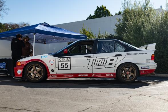White BMW 3 series sedan with race livery