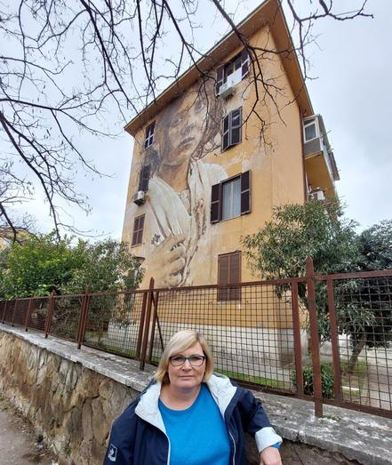 "Io Sarò" by Guido Van Helten on Viale di Tor Marancia in Rome, Italy