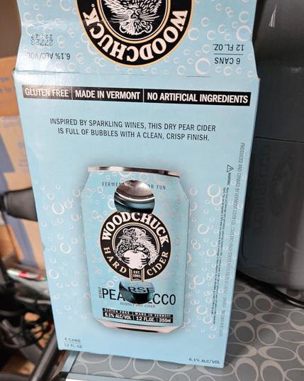 Carton of cans of "Pearsecco" alcoholic drink from a producer in Vermont, Woodchuck Hard Cider