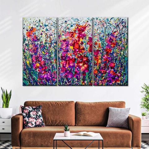 The Breath Of Summer 
Garden Explosion, A vibrant triptych painting with a burst of colors and floral motifs.