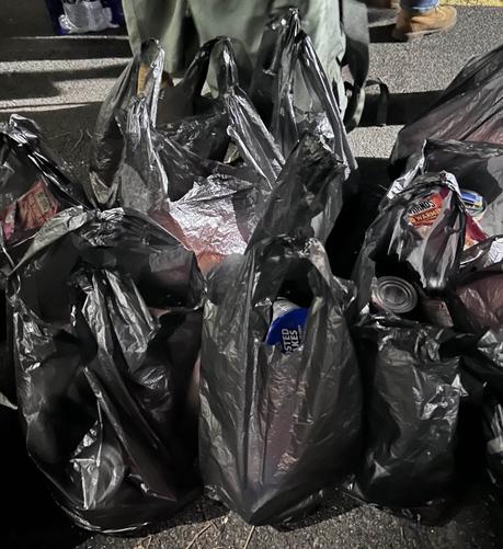 a cluster of plastic bags filled with supplies
