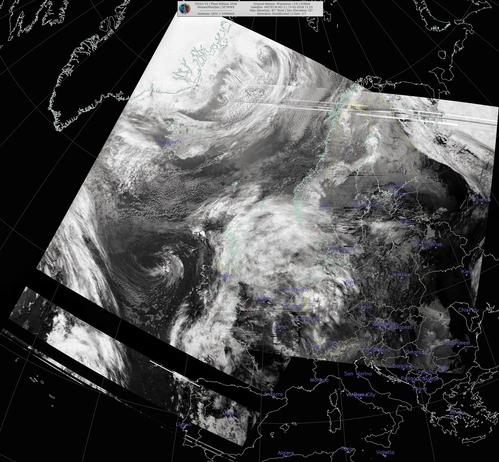 Satellite image showing cloud formations over Europe and parts of North Africa, with visible country and city names.