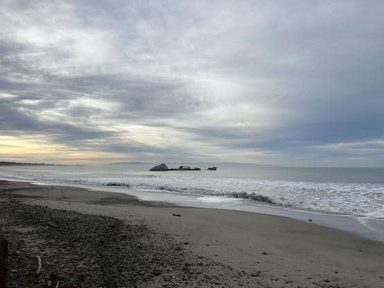 Looking south-east from Seacliff State Beach toward Monterey. The remains of the SS Palo Alto is in the foreground.
