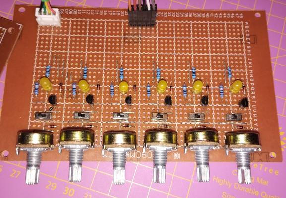 finished perfboard for the six steps. it consists of six potentiometers, six switches, and six LEDs.