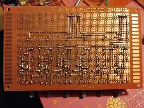 bottom of the perfboard showing the soldering