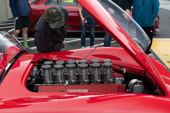 A view in the engine bay of the Cobra, showing 12 independent throttle bodies.