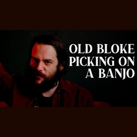 A thumbnail for the video Old Bloke Picking On a Banjo, which features a dimly-lit Andy staring moodily at the camera