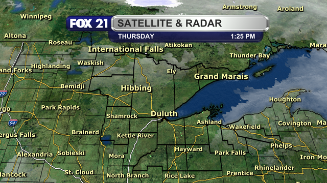 The satellite and radar over the Northland at 1:25 p.m. on Thursday, February 22, 2024 shows mostly clear skies over the region with no precipitation.  Only a bit of light cloud cover is working through the Rainy River Basin from north to south.