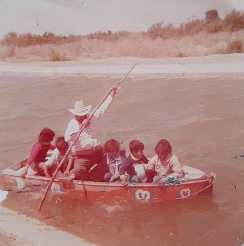 photo - Grandfather and children in canal, circa 1970, Mexicali’s Colorado River
