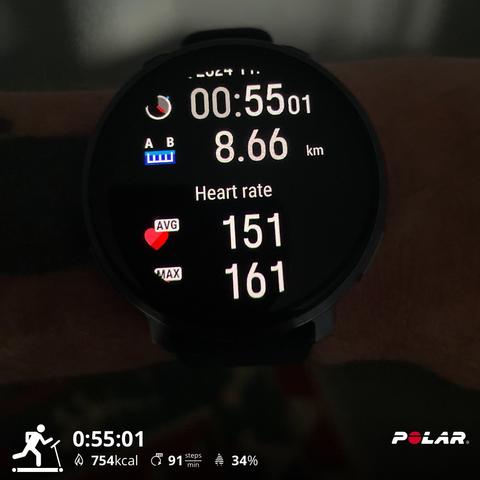 Polar running watch showing duration, distance, average and max heart rate
