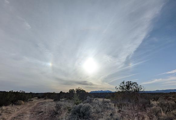 Sundogs, connected by a 22-degree halo