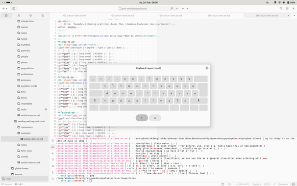 GNOME Builder with Tecla keyboard layout hovering on top.