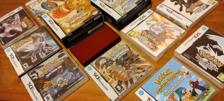 A Nintendo DS and a selection of Pokémon titles that were playable on the console