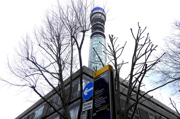 View looking up at the BT Tower from the corner of Maple Street and Cleveland Street, Fitzrovia, London.