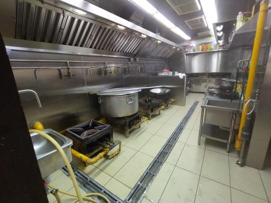 the cooking area of a langgar (community kitchen) in a neighbourhood gurdwara (Sikh temple).