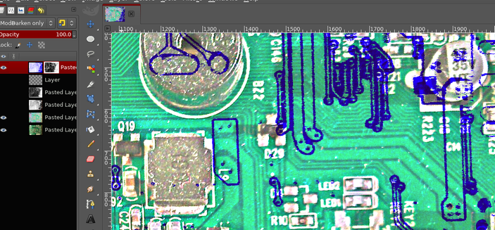 A screenshot of GIMP showing multiple layers of a photo of a PCB, with the backside paths overlaid.