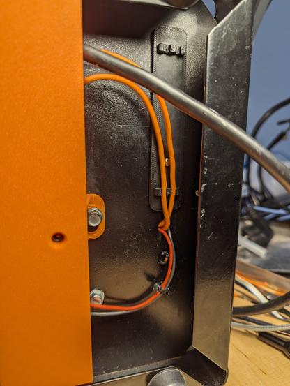 Underside of the Rancilio Silvia espresso machine 3D printed bracket with integrated cable holder for the SSR live wires. 
The bracket is for mounting the electronic box on the inside.