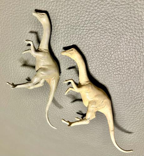 Two lanky dinosaur model, an original sculpture from about 1960 (right) and one of the plastic toys made from the mould of it.