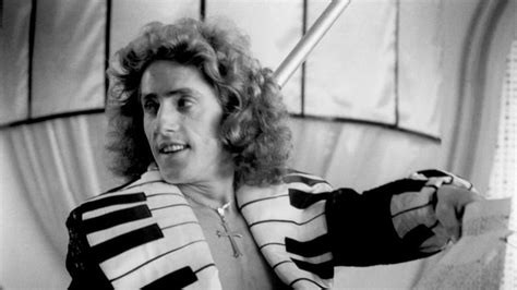 Roger Daltrey wearing a totally wild keyboard suit thing